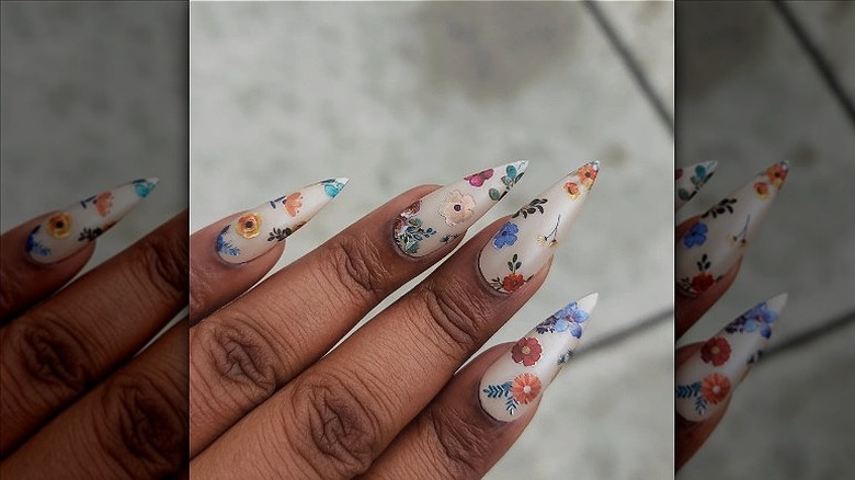 nails with floral stickers 