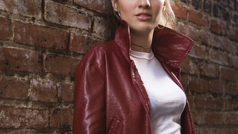 woman in brown leather jacket