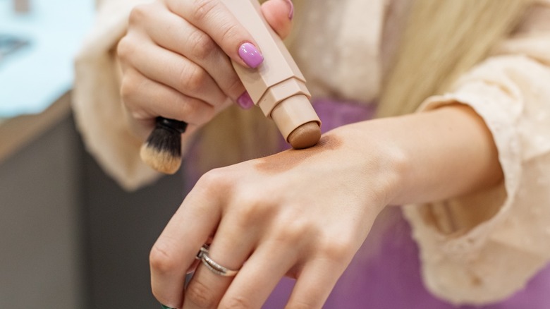 woman testing contour stick