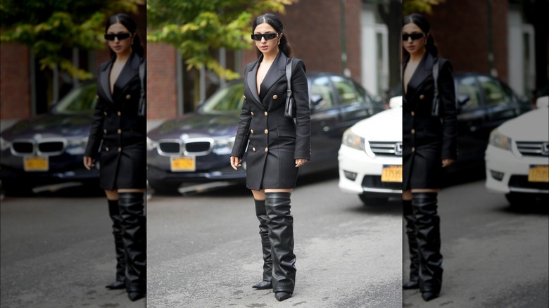 woman wearing blazer dress and boots