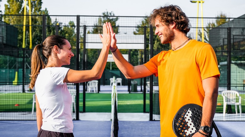 Padel players on court