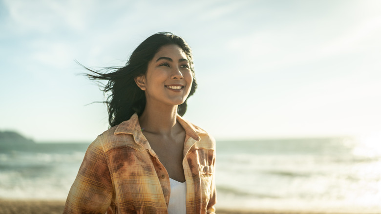 Woman smiling outside