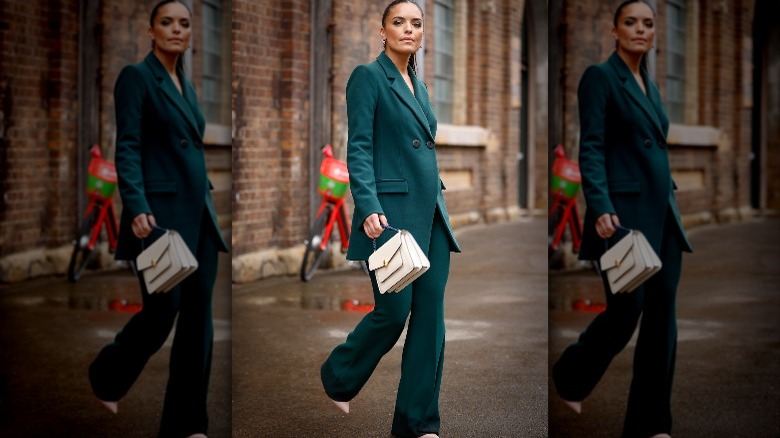 woman wearing green suit 