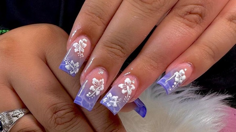 water manicure with white flowers