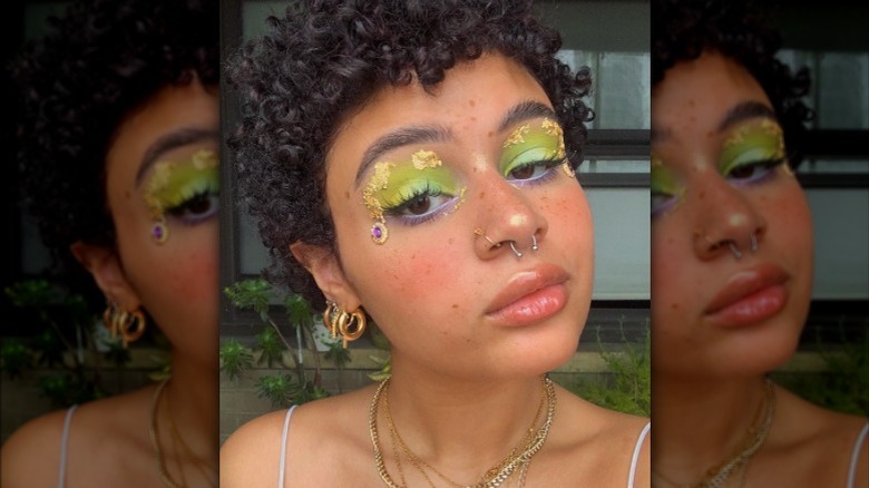 girl wearing green eyeshadow