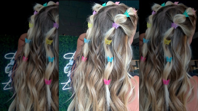 Blonde half-up butterfly clip style