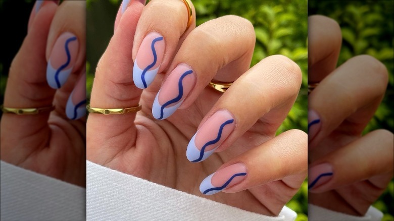 classic French manicure with wavy lines