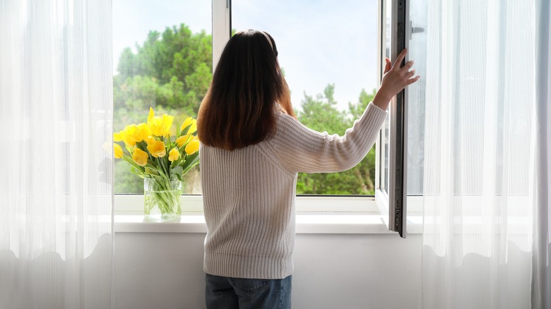 Woman with yellow flowers