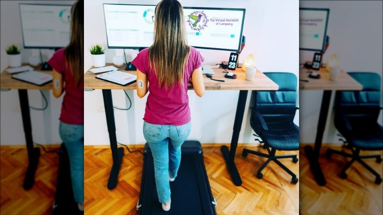 woman on under desk treadmill