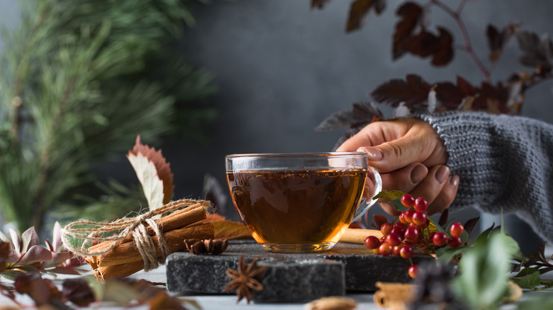 A woman's hand holding tea