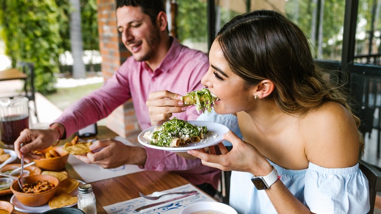 Couple eating at restaurant