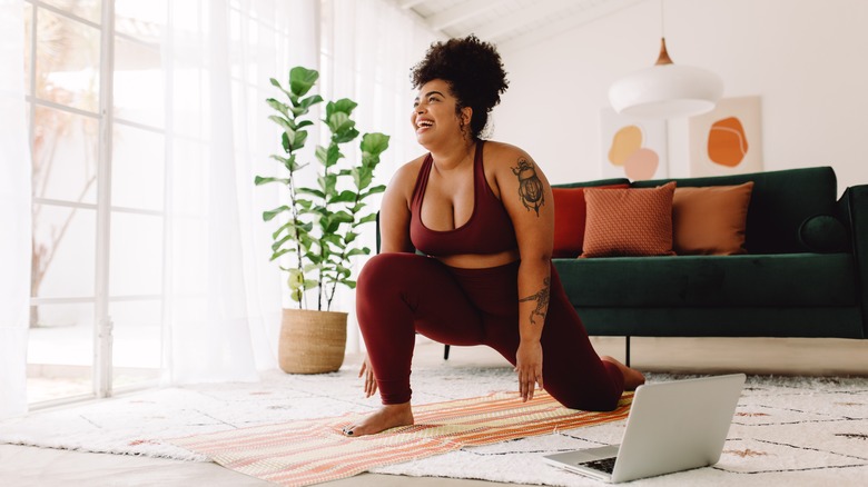 Woman doing yoga at home 