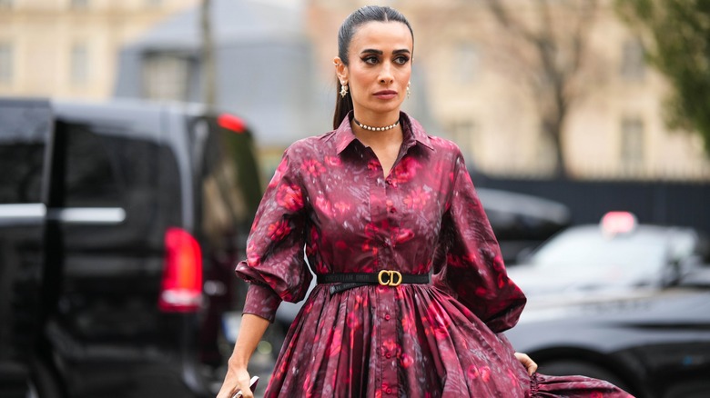 woman wearing maroon printed dress