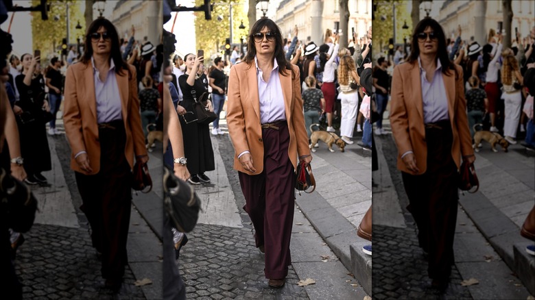 woman wearing cherry black pants