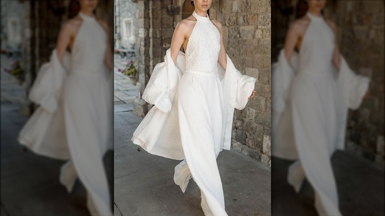 Woman in white bridal suit 