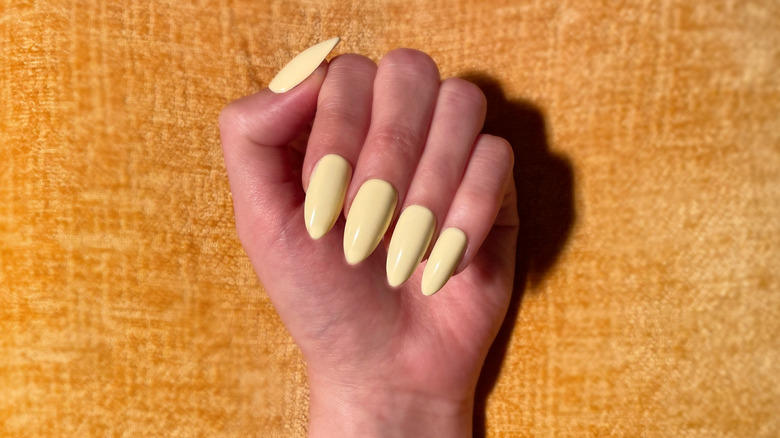 Long butter-yellow nails
