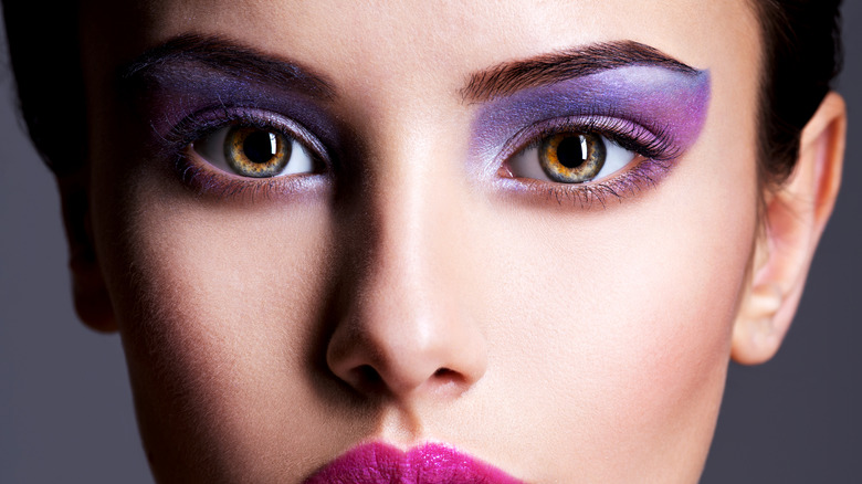 close up of woman with lilac and purple eyshadow