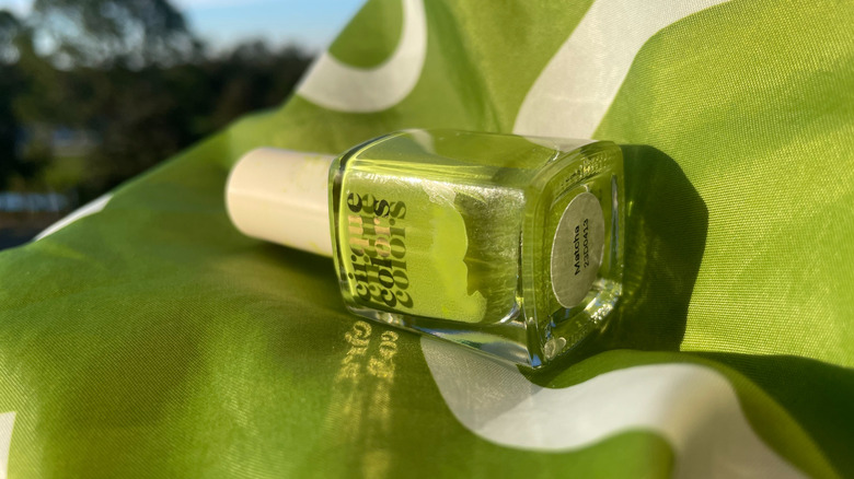 Cirque Colors Matcha swatch pictured outdoors