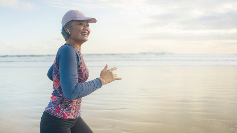 Woman running on the beach