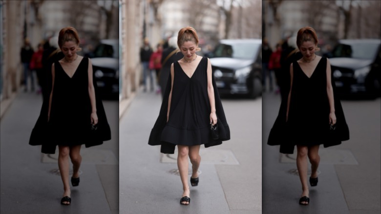 woman wearing black dress