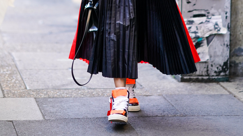 Black skirt and sneakers