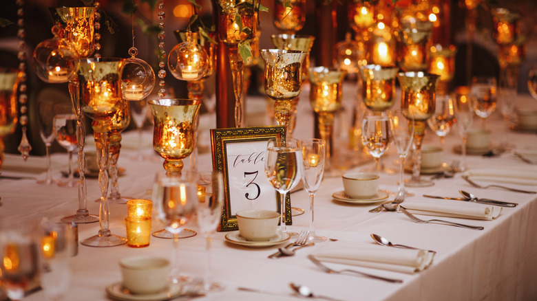 White and gold wedding table setting