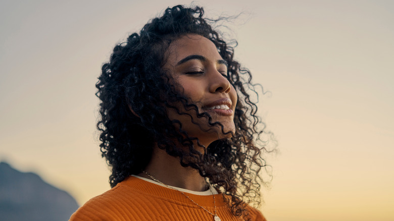 woman smiling in sun