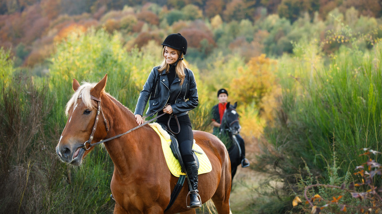 woman on trail ride