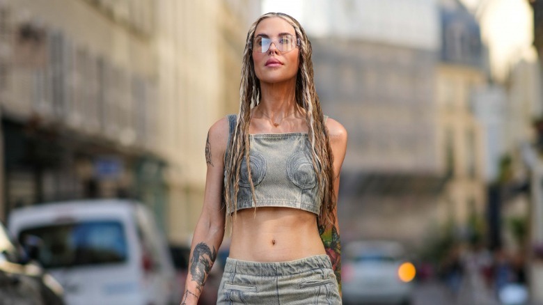 woman wearing gray denim bralette