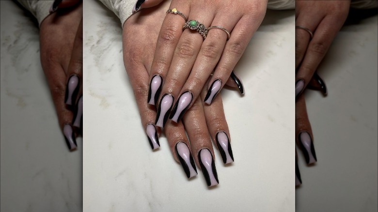 person with hourglass nails
