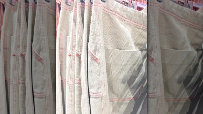 white jeans with pink contrast stitching