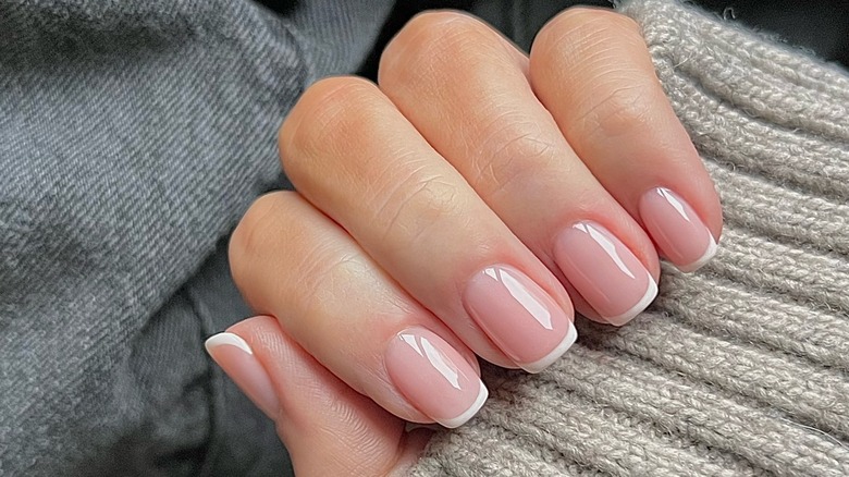 Squoval French tip manicure