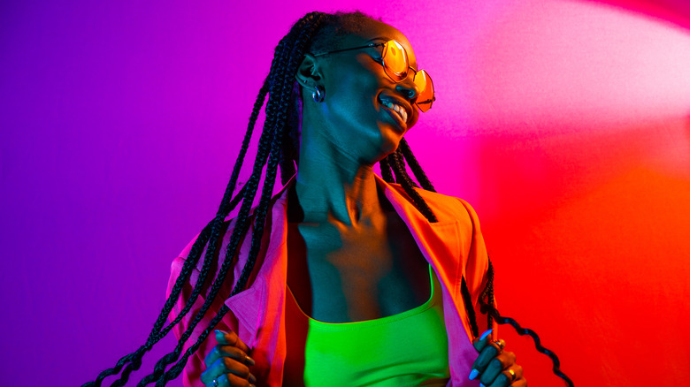 trendy woman on neon background