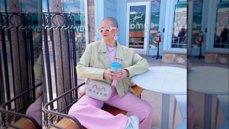 Woman in pastel colored outfit