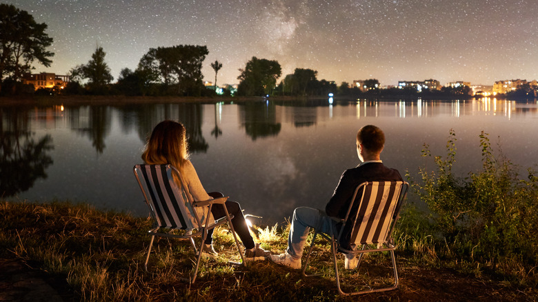 Couple sitting under the stars