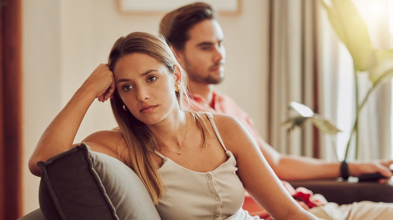 a couple annoyed with each other after a argument