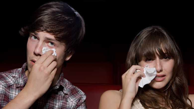 man and woman crying