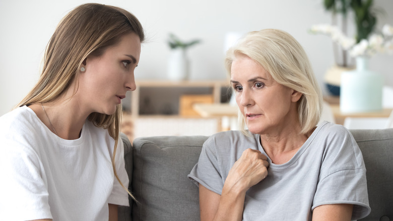 mother confiding in daughter