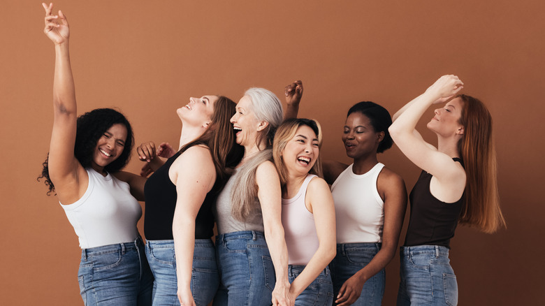 diverse group of women laughing