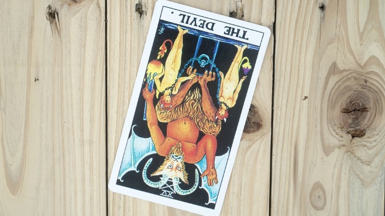 Reversed devil tarot card