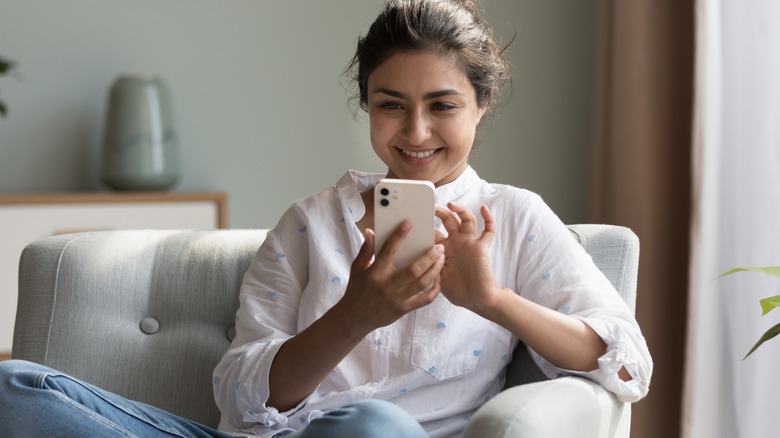 Woman holding a cell phone