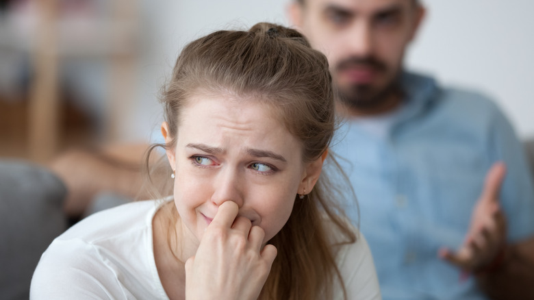 Woman getting shouted at by her partner