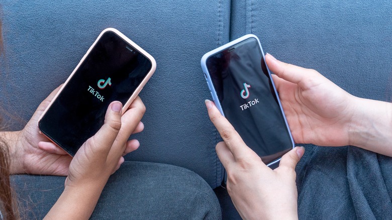 Two iPhones display TikTok logo