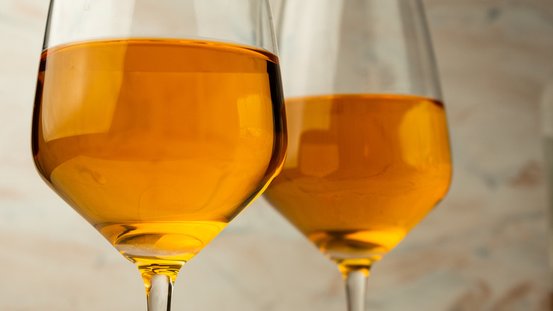 Two glasses of orange wine