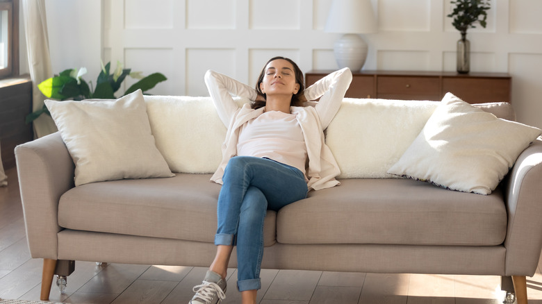 woman relaxing in living room