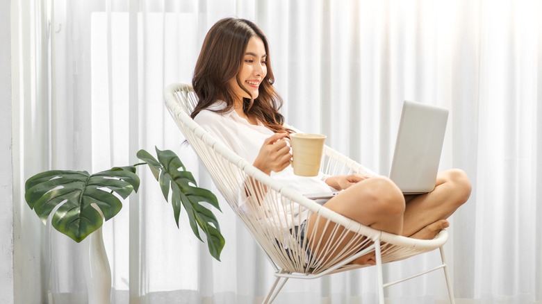 happy woman on a laptop