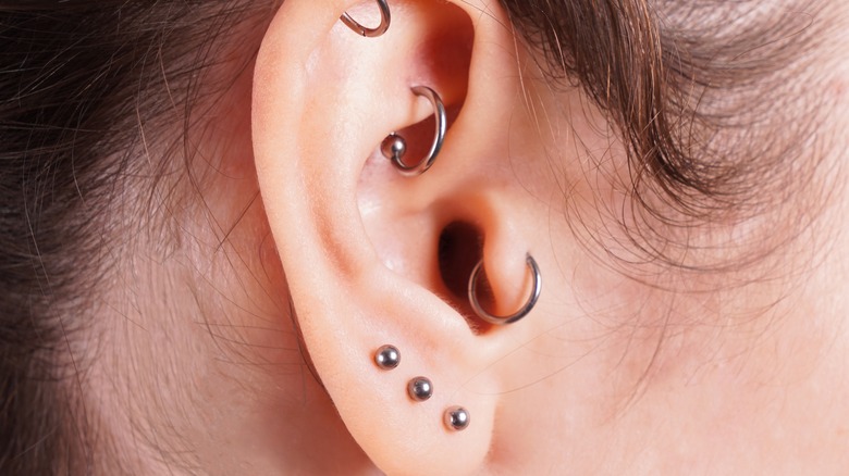 Lobe, helix, rook, and tragus piercings