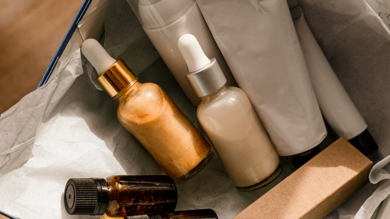 foundations, skincare and beauty products in a box
