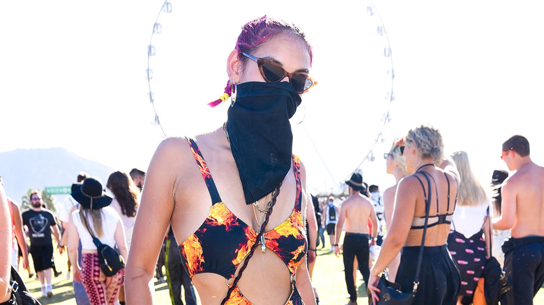 Person wearing a bandana over face at Coachella