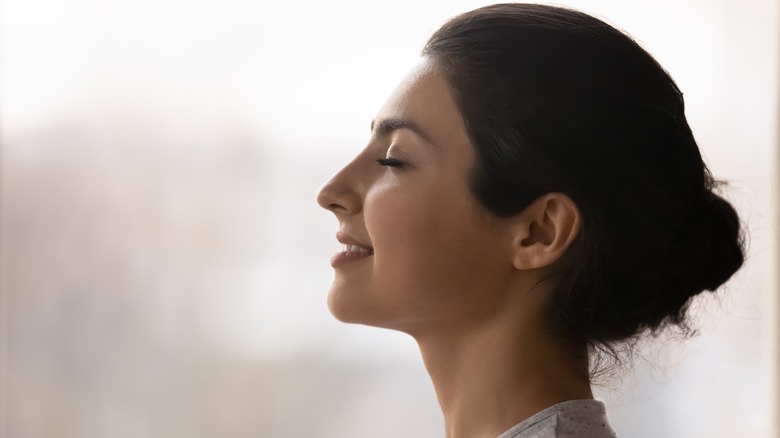 woman smiling side profile